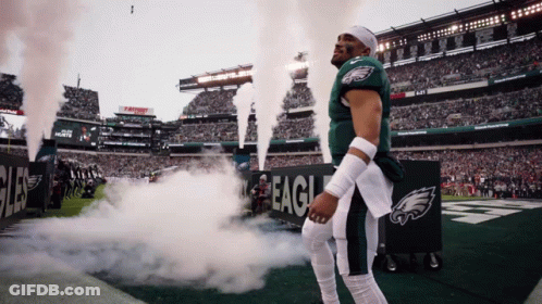 Man In Green Eagles Jersey On Field GIF