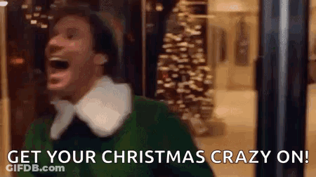 Man In Green Elf Costume Laughing GIF