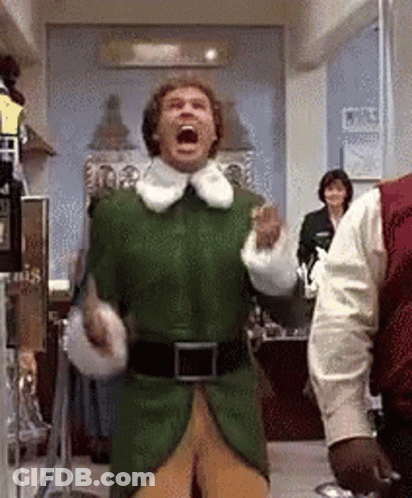 Man In Green Elf Costume Screaming With People GIF
