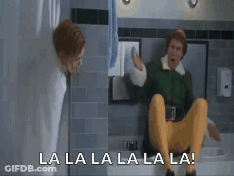 Man In Green Elf Costume Sitting On Toilet Singing GIF