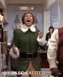 Man In Green Elf Costume Standing GIF
