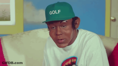 Man In Green Golf Hat Sitting GIF