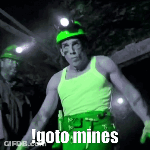 Man In Green Hard Hat And White Tank Top Says Goto Mines GIF