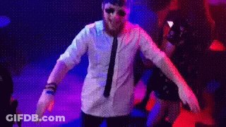 Man In Green Hat Sitting At Microphone GIF