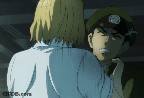 Man In Green Hat With Circle Holding Woman GIF