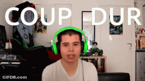 Man In Green Headphones Before Coup Dur Wall GIF