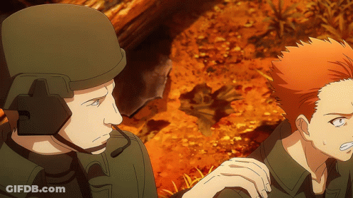 Man In Green Helmet Talking To Woman With Red Hair GIF