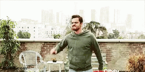 Man In Green Hoodie Dancing On Rooftop GIF