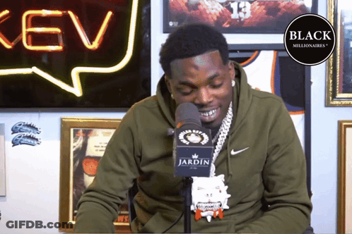 Man In Green Hoodie In Front Of Microphone Jardin GIF