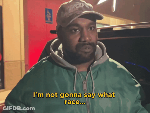 Man In Green Jacket And Hat Says I'm Not Gonna Say What Race GIF