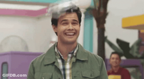 Man In Green Jacket And Plaid Shirt Laughing GIF