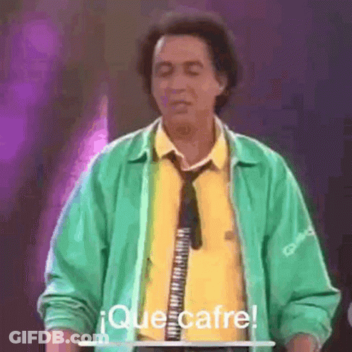 Man In Green Jacket And Tie Eyes Closed At Microphone GIF