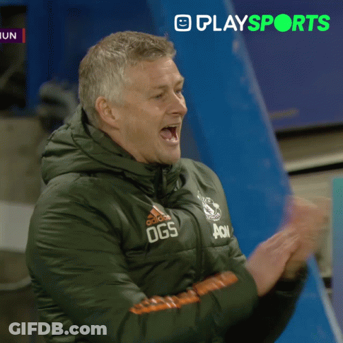 Man In Green Jacket Giving Thumbs Up GIF
