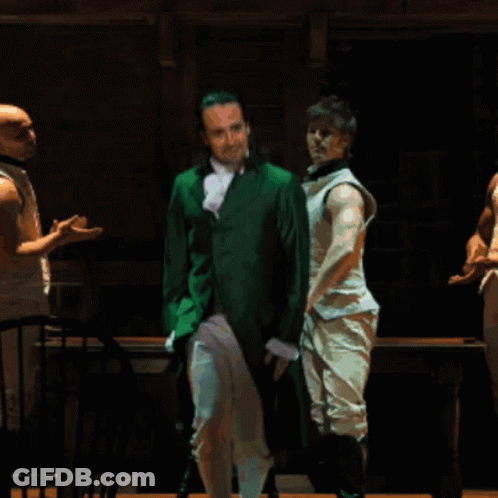 Man In Green Jacket Holding Woman's Leg GIF