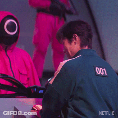 Man In Green Jacket Number 001 Giving OK Sign GIF