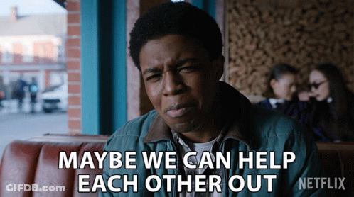 Man In Green Jacket Saying Maybe We Can Help GIF