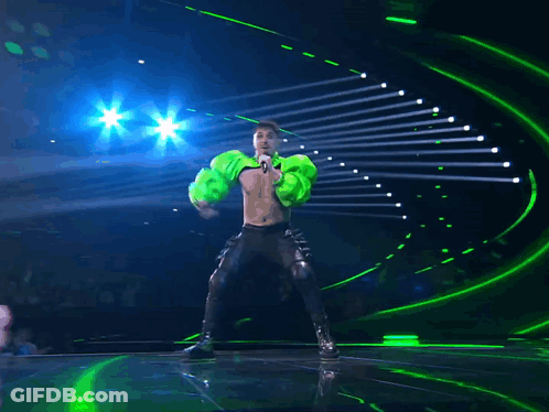 Man In Green Jacket Singing GIF