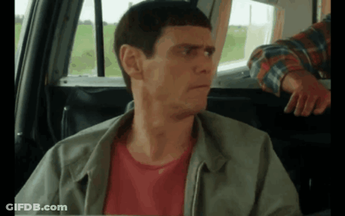 Man In Green Jacket Sitting In Back Seat GIF