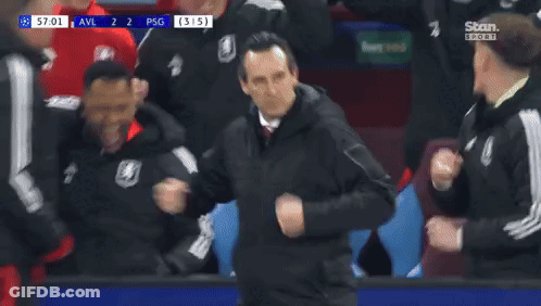 Man In Green Jacket Watching Soccer On Stan Sport GIF