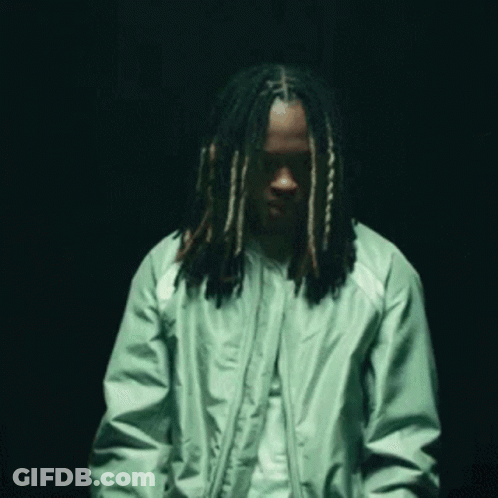 Man In Green Jacket With Long Dreadlocks GIF