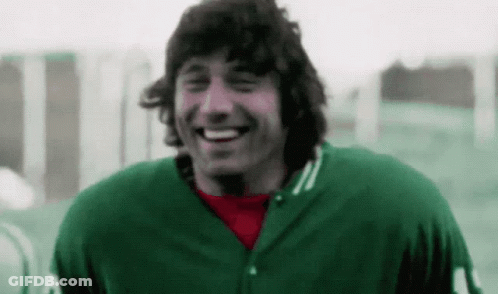 Man In Green Jersey Number 10 Smiling GIF