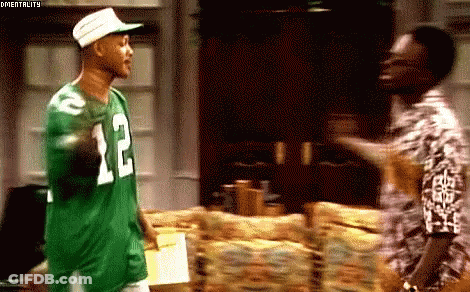 Man In Green Jersey Number 12 Talking GIF