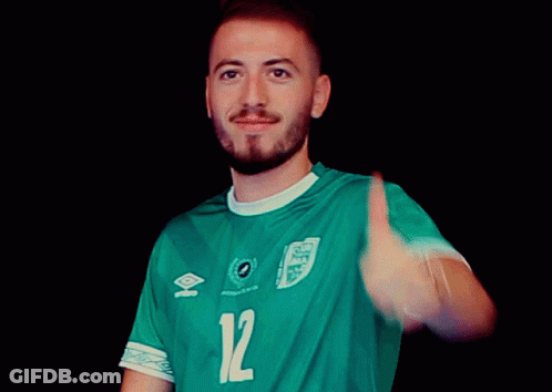 Man In Green Jersey Number 12 Thumbs Up GIF