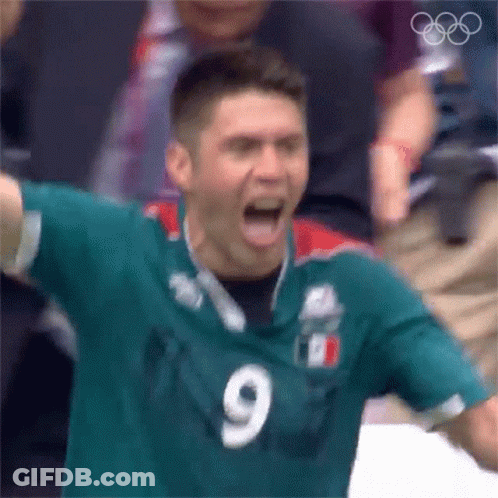 Man In Green Jersey Number 9 Screaming GIF