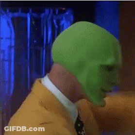 Man In Green Mask And Yellow Jacket GIF
