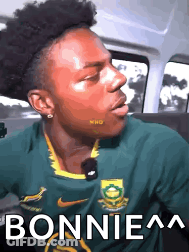 Man In Green Nike Shirt With Bonniea GIF
