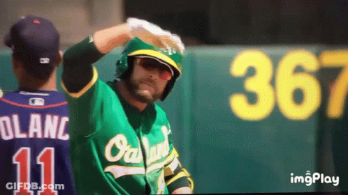 Man In Green Oakland Jersey Before Sign 367 GIF