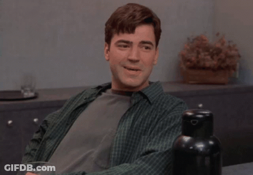 Man In Green Plaid Shirt Smiling GIF