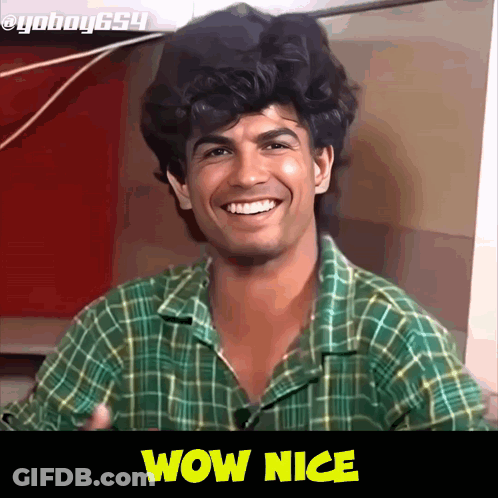 Man In Green Plaid Shirt Smiling Wow Nice GIF