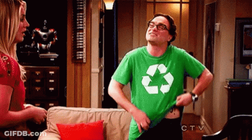 Man In Green Recycling Shirt Standing With Woman GIF