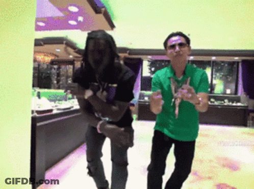 Man In Green Shirt And Man In Black Shirt GIF