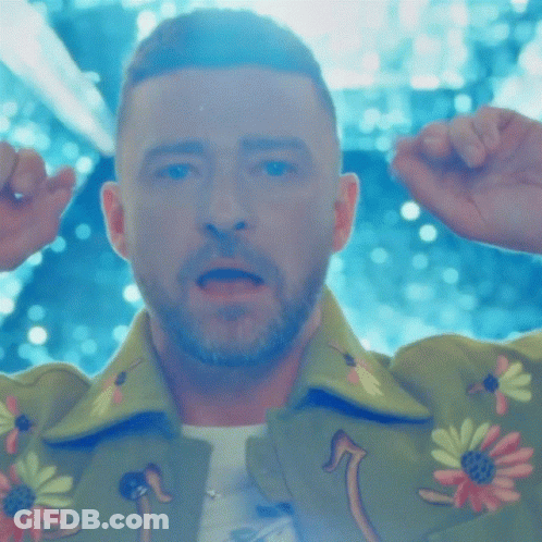 Man In Green Shirt Covering Ears GIF