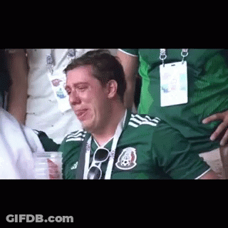 Man In Green Shirt Crying In Stands GIF