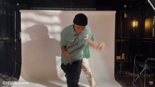 Man In Green Shirt Dancing GIF