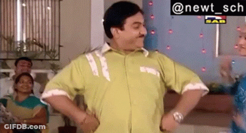 Man In Green Shirt Dancing Hands On Hips GIF