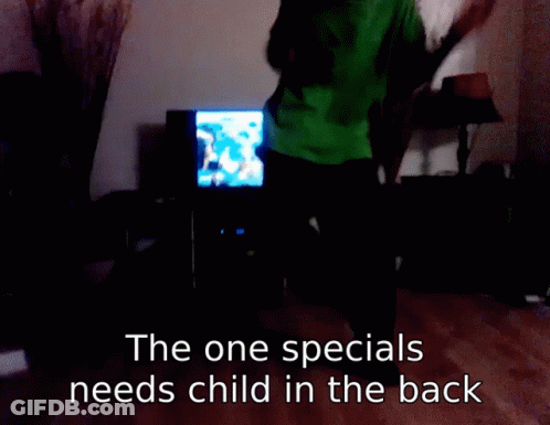 Man In Green Shirt Dancing In Front Of TV The One Specials Needs Child GIF
