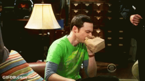 Man In Green Shirt Eating Sandwich GIF
