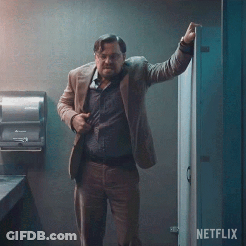 Man In Green Shirt Eating Sandwich Its Gna Go Down To The Wire GIF