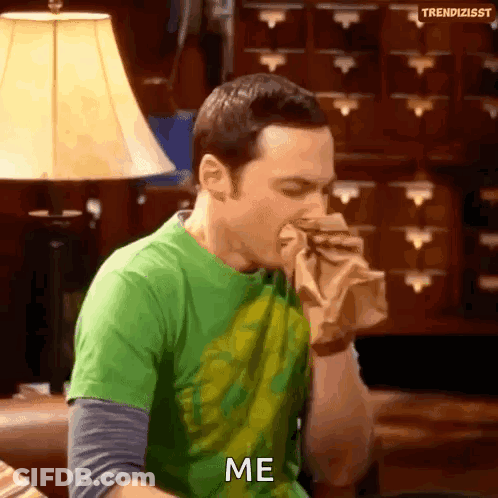 Man In Green Shirt Eating Sandwich Saying Me GIF