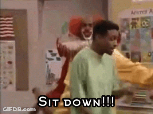 Man In Green Shirt Facing Clown GIF