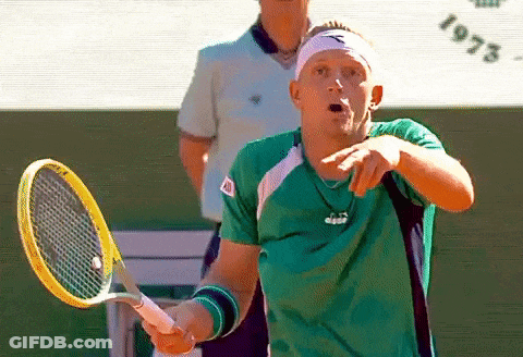 Man In Green Shirt Holding Tennis Racquet GIF