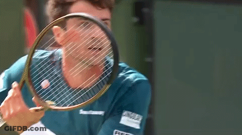 Man In Green Shirt Holding Tennis Racquet GIF