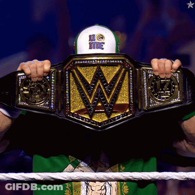 Man In Green Shirt Holding Wrestling Championship Belt GIF