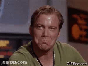 Man In Green Shirt Making Funny Face GIF