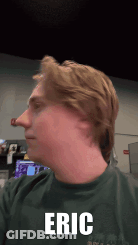 Man In Green Shirt Named Eric GIF