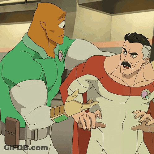 Man In Green Shirt Next To Man In Red And White Suit GIF